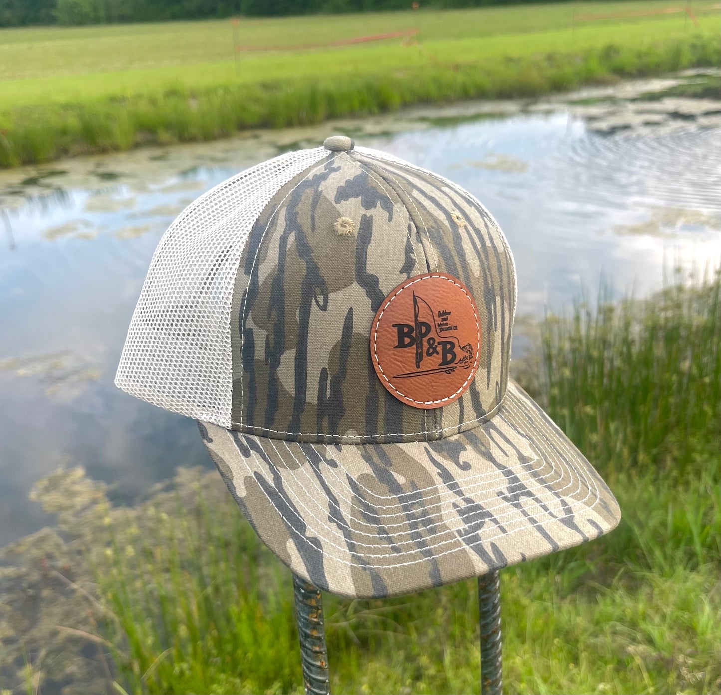 BP & B Mossy Oak Camo Leather Logo Hat