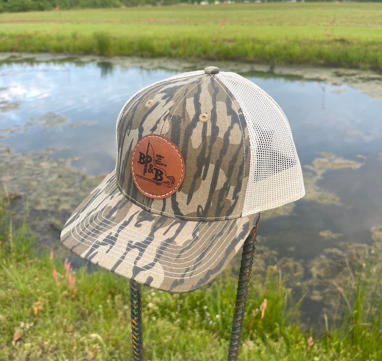 BP & B Mossy Oak Camo Leather Logo Hat